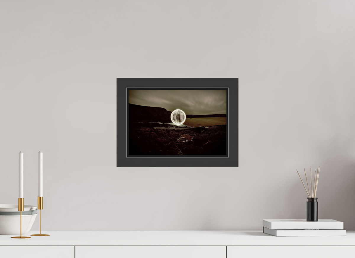12 x 8″, Framed (Black) B&W Orb on the beach in Wales
