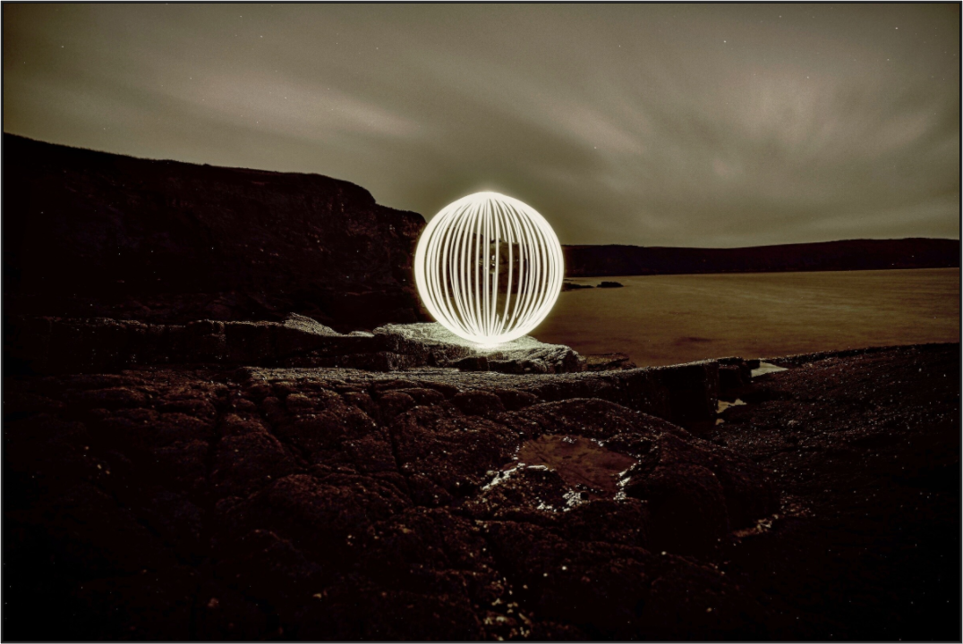 Main image B&W Orb on the beach in Wales